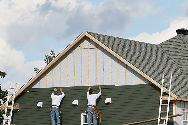 Professional Siding technician working in Todd, PA